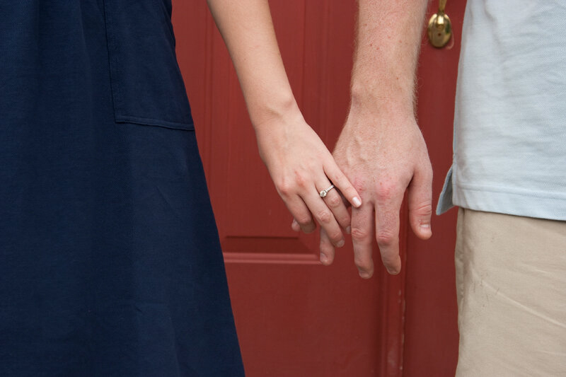 man and woman engagement image with ring