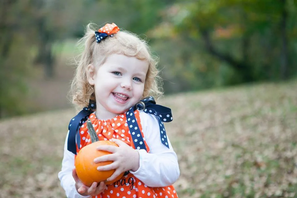 girl with pumpkin