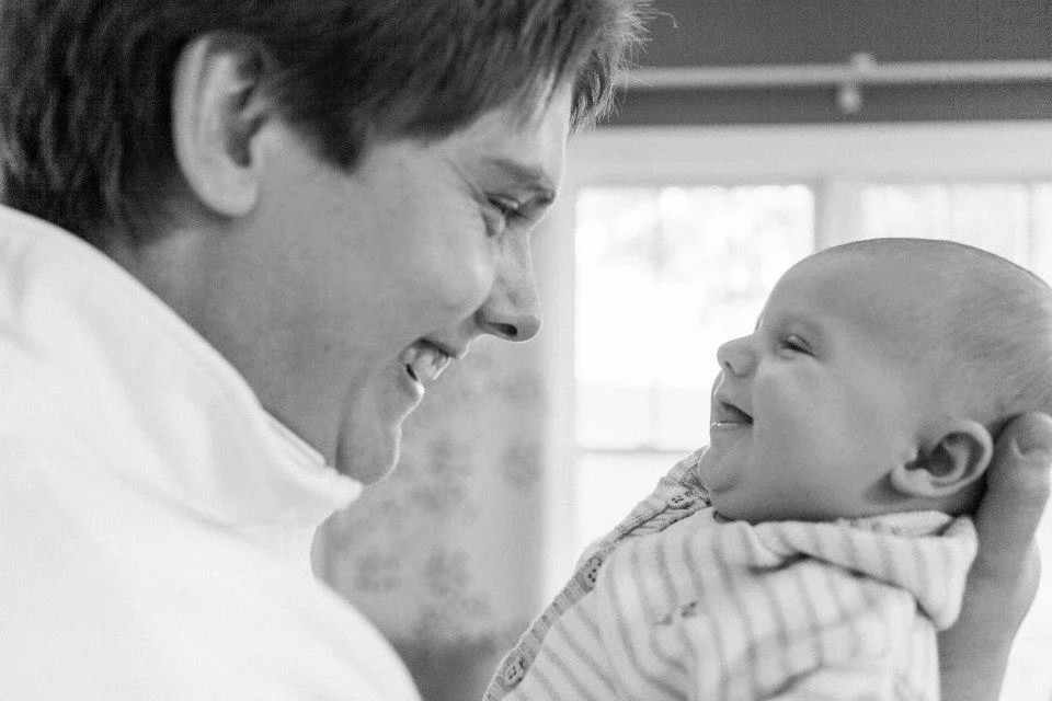 man with baby