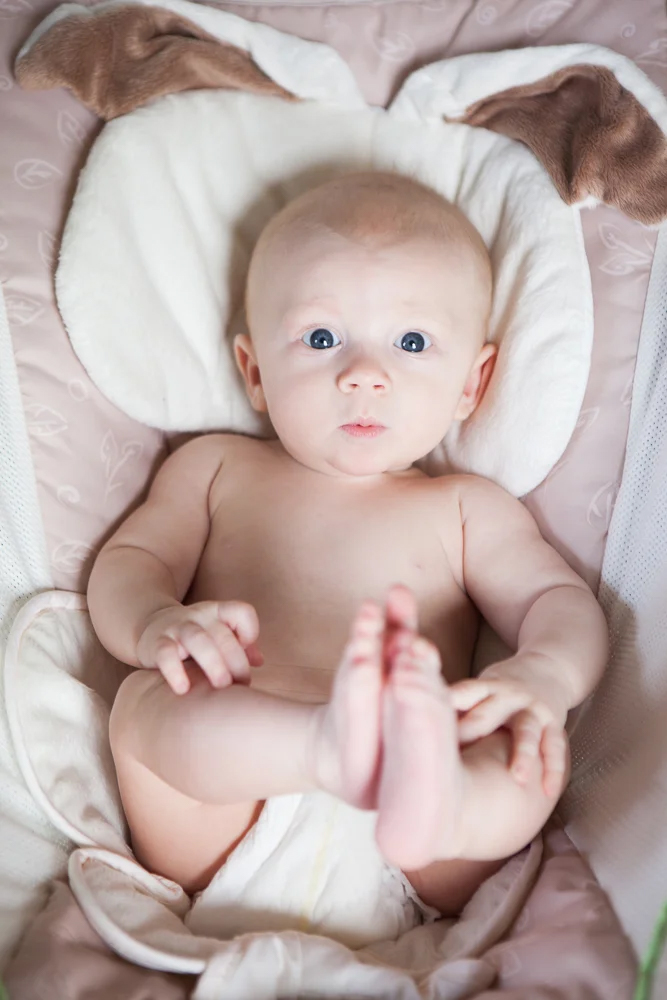 baby on bed