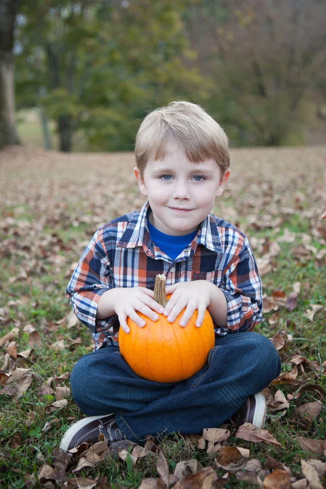 boy with pumpkin