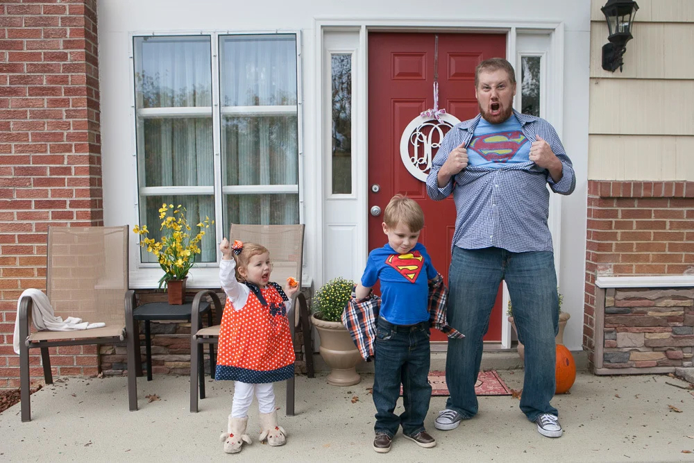 dad with kids on porch