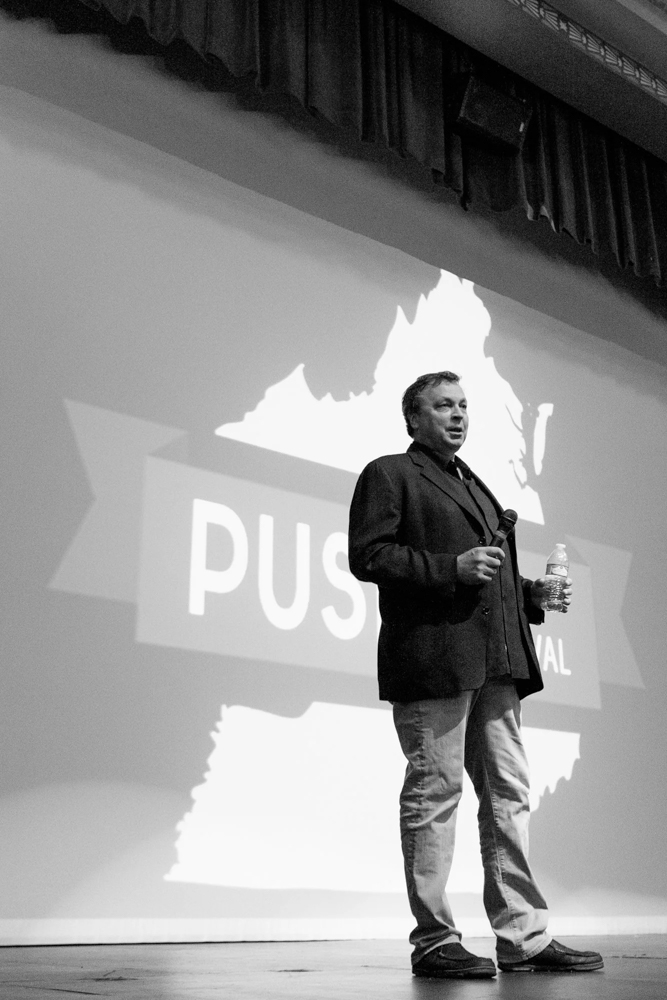 Man presenting on stage