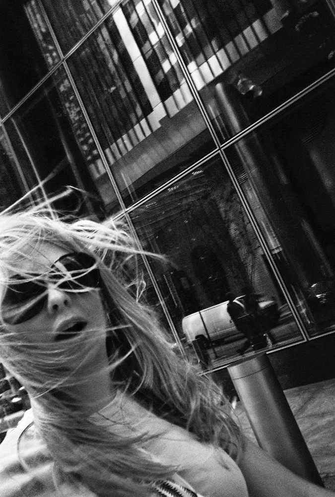 woman on the street in black and white